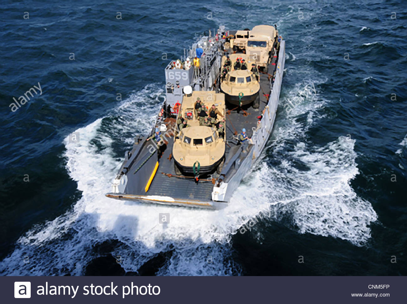 .com%2Fcomp%2FCNM5FP%2Fa-us-navy-landing-craft-approaches-the-well-deck-of-the-amphibious-CNM5FP.jpg