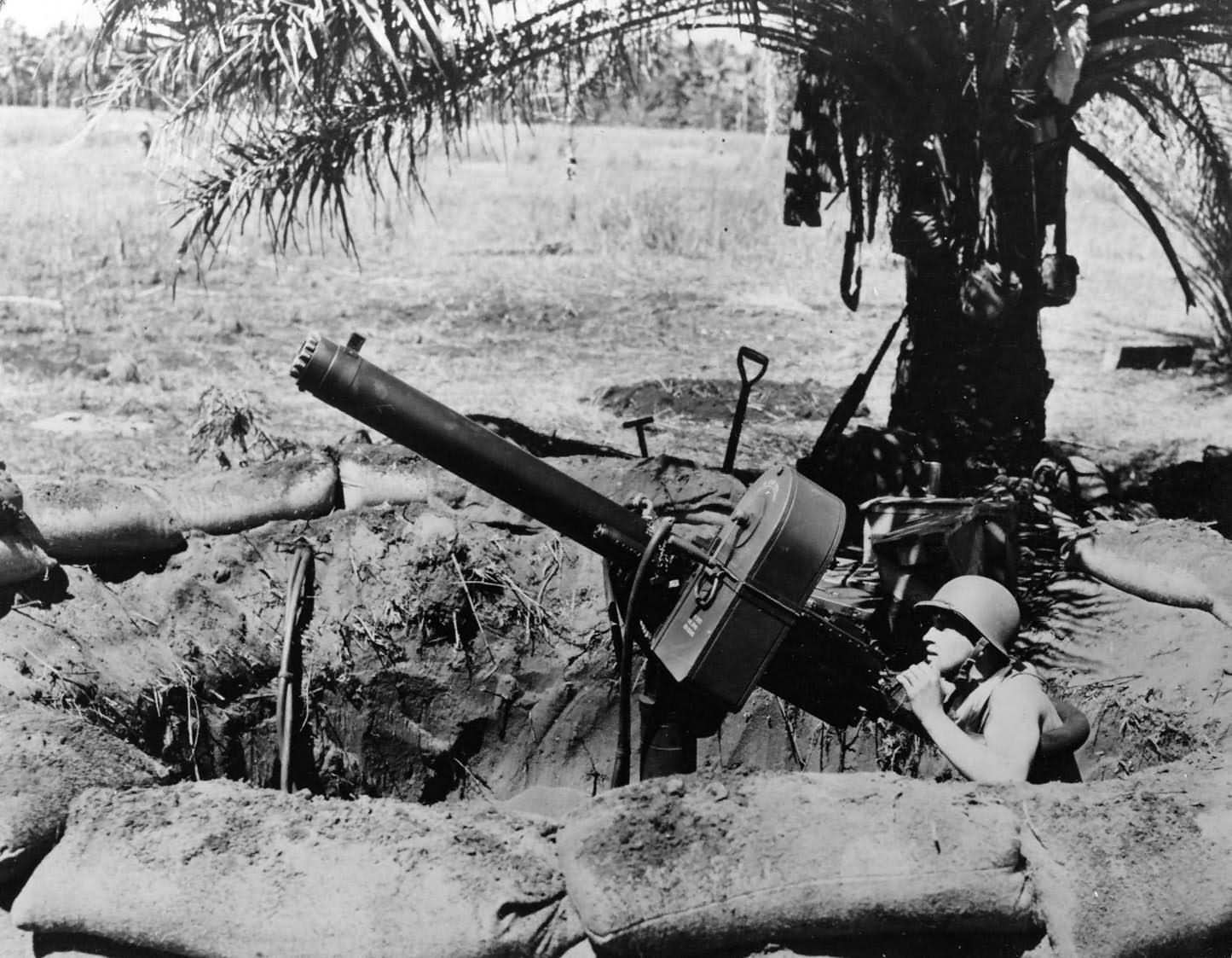 Guadalcanal_Marine_at_50_cal_anti_aircraft_mg_1942.jpg