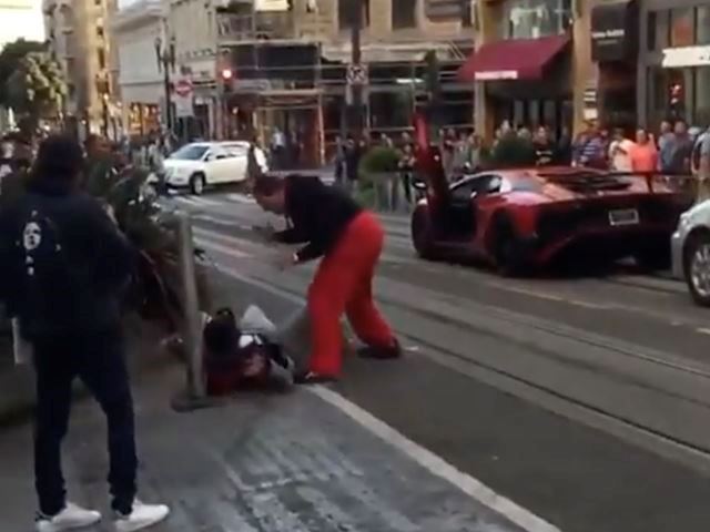 Guy-Knocked-Out-By-Lamborghini-Owner-5-1.jpg