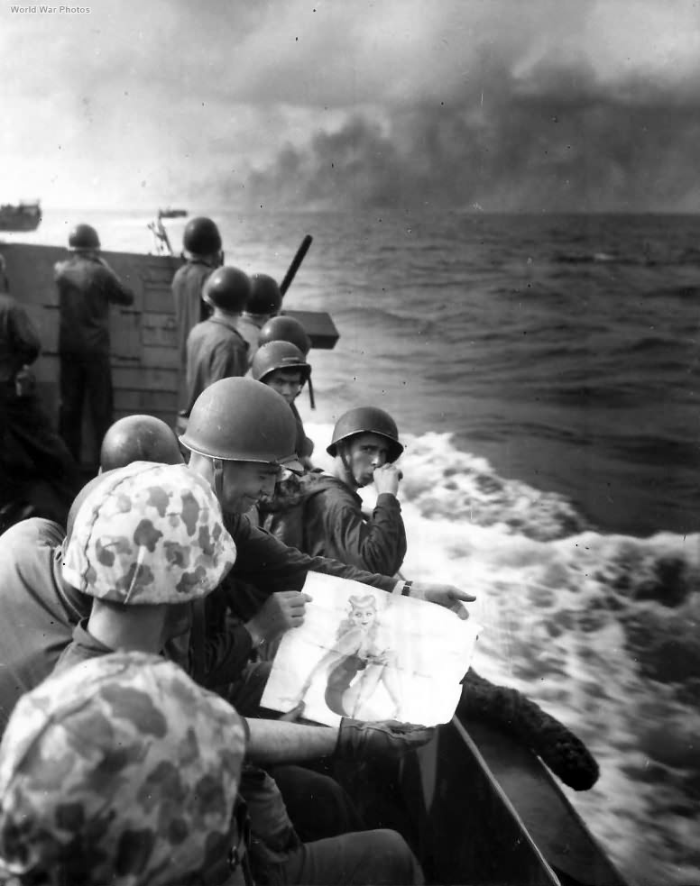Marines_with_Pin-Up_girl_Picture_in_Landing_Craft_off_Tarawa.jpg