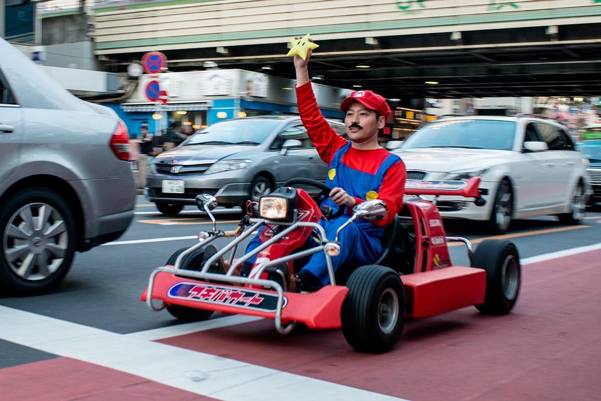 Mario-Karts-drive-around-Tokyo-streets.jpg